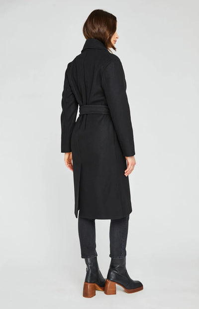 A belted, black wool coat for fall and winter.